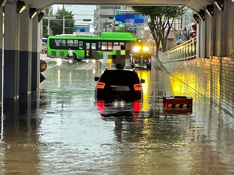 Car Driving in Heavy Rain